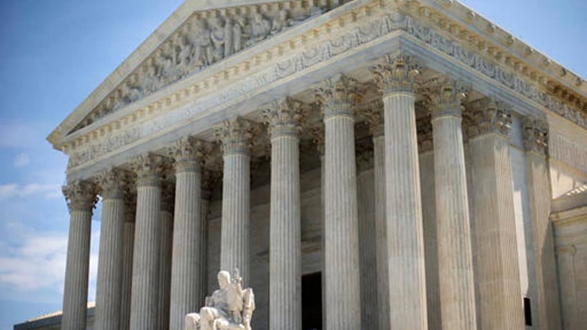 FILE - In this June 30, 2014file , the Supreme Court building is seen in Washington. Conservatives who care about the court say they have no such worry this time around. They feel confident that whomever President Donald Trump nominates for the Supreme Court, they wonât be looking back with regret in the years to come. (AP Photo/Pablo Martinez Monsivais, File)