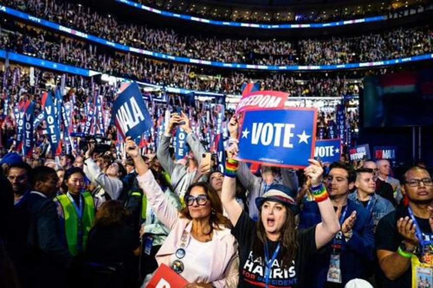 the torch has been passed protests escalate as obamas rinos take the stage on dnc day 2