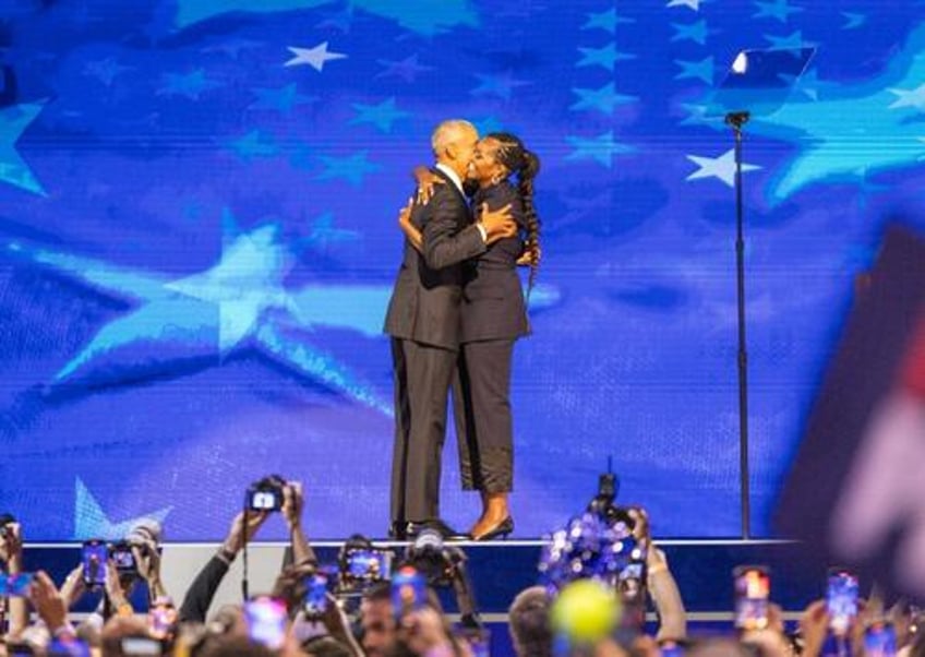 the torch has been passed protests escalate as obamas rinos take the stage on dnc day 2