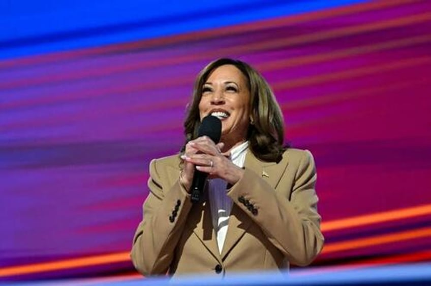 the torch has been passed protests escalate as obamas rinos take the stage on dnc day 2