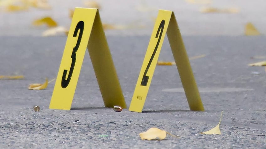 Bullets at scene outside the Hilton Hotel in midtown Manhattan where Brian Thompson, the CEO of UnitedHealthcare, was fatally shot.