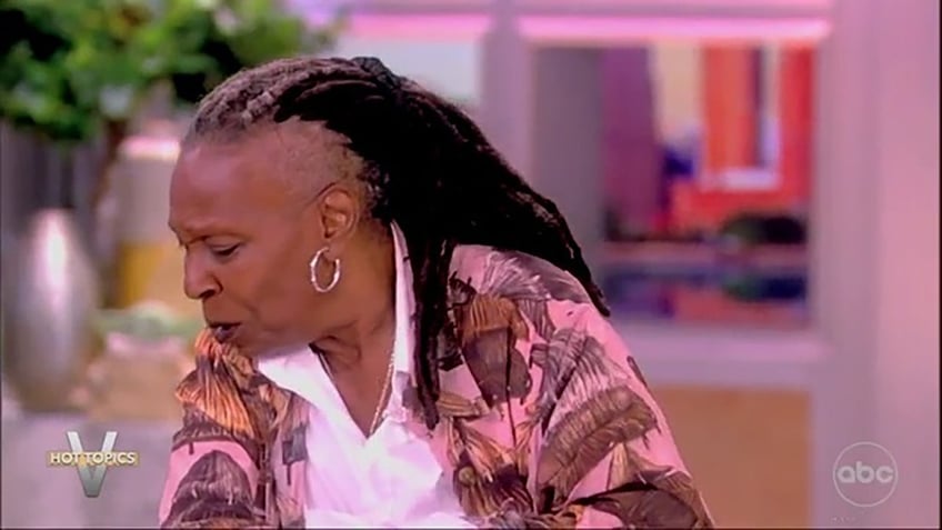 "The View" host Whoopi Goldberg spitting