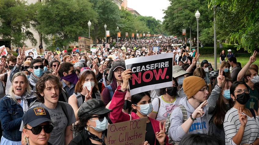 Pro-Palestinian protesters march at the University of Texas