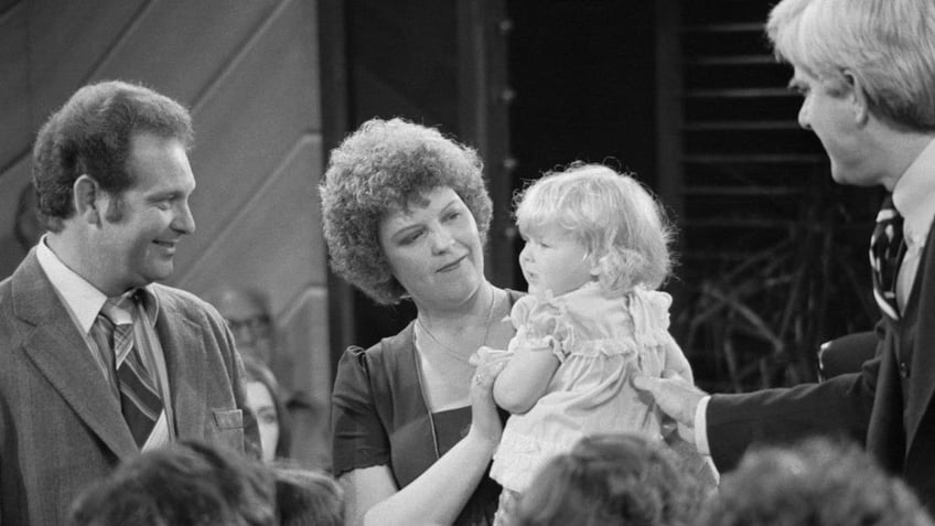 Louise Brown with her parents on TV 