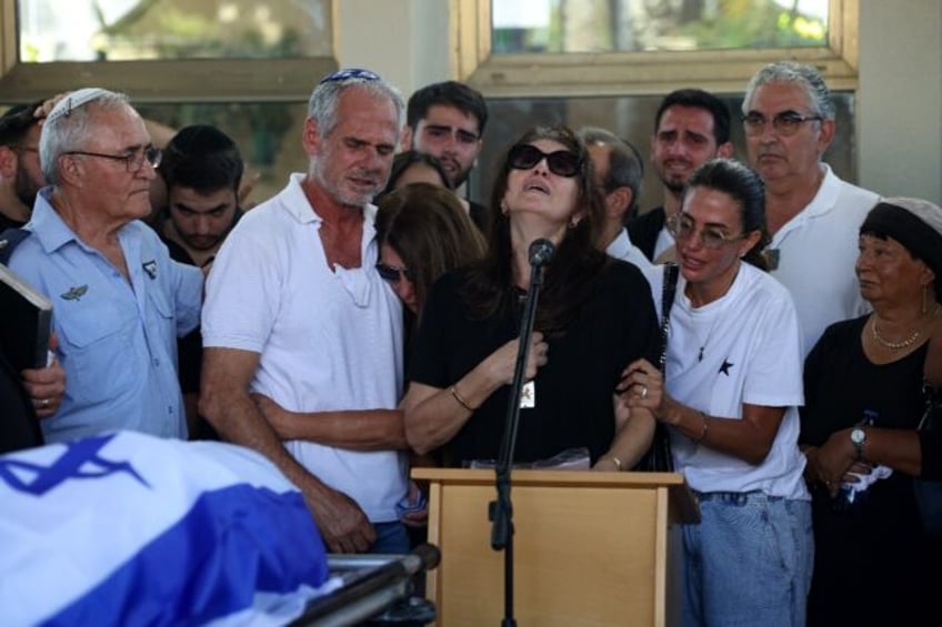 Nira, the mother of Almog Sarusi, an Israeli hostage killed in Gaza, during the funeral of