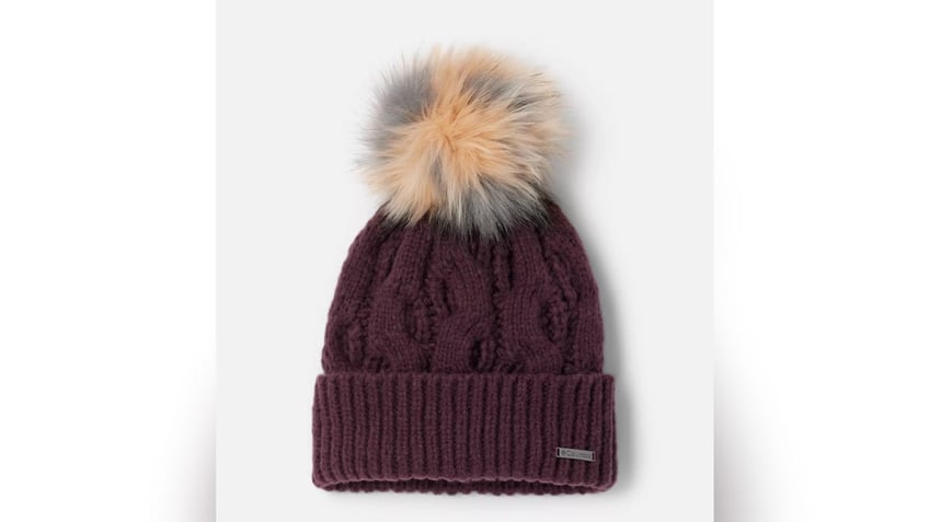 Pom pom beanies are a classic look for winter.