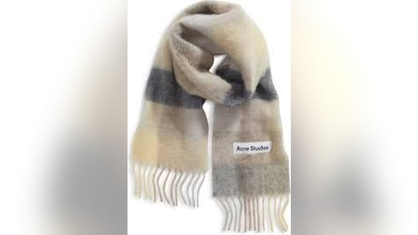 Grab this warm, oversized scarf for a trending winter look.