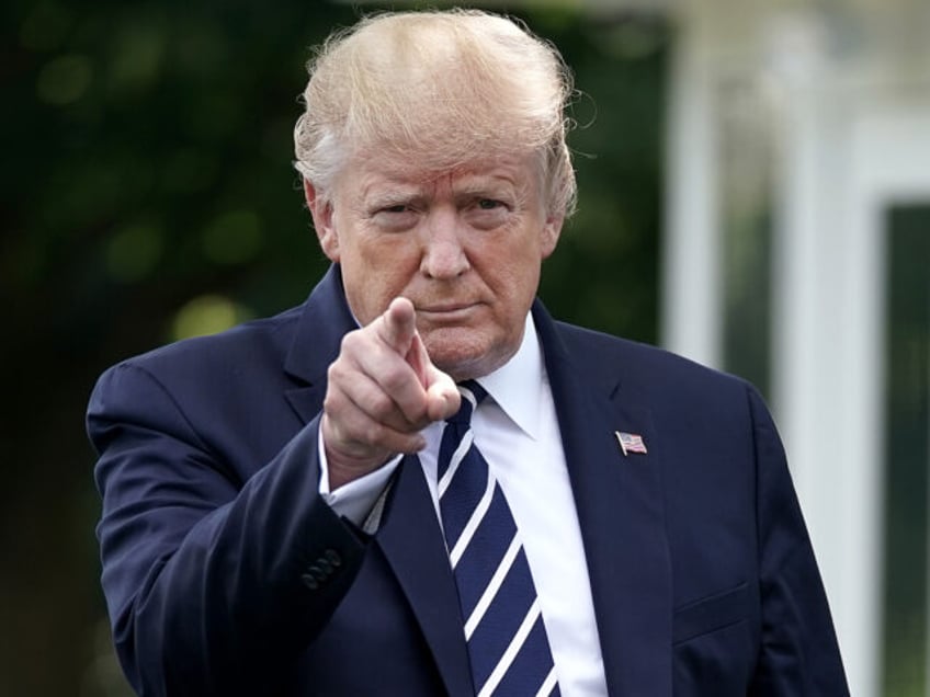 WASHINGTON, DC - JULY 19: U.S. President Donald Trump walks out of the White House before