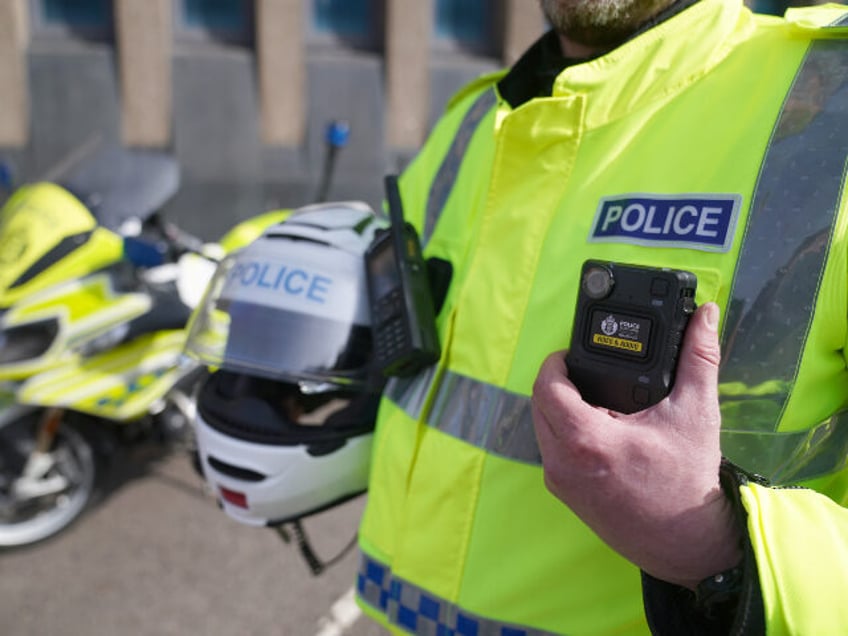 A police motorcyclist during the Police Scotland national launch of body-worn video camera