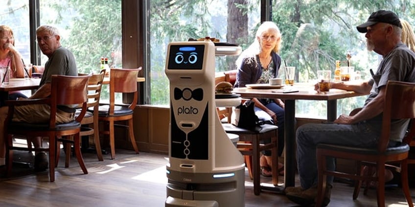 this tech is the sad reality of restaurant industrys future business owner says robot works 12 hours a day