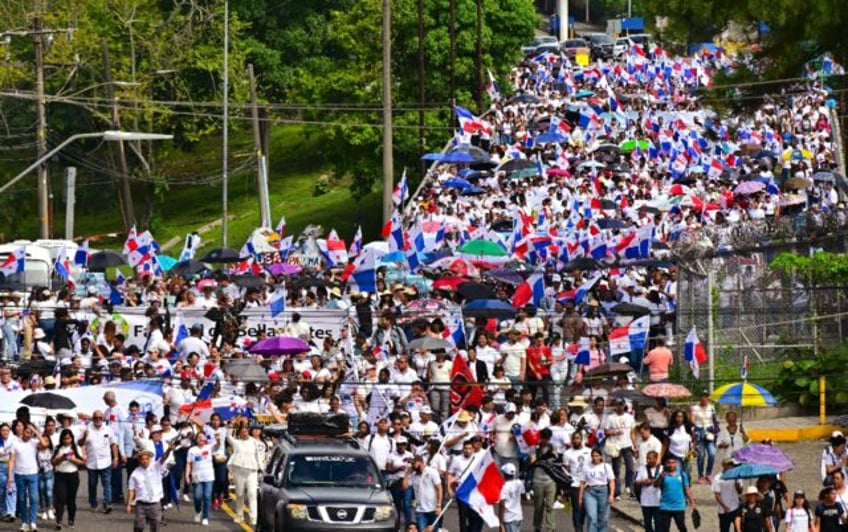 Thousands of government critics demonstrated in Panama City to protest a deal allowing the