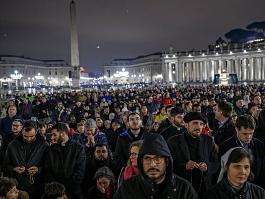 VATICAN CITY, VATICAN - FEBRUARY 24: Faithful pray for the health of Pope Francis during a