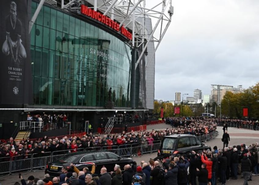 thousands line manchester streets to bid final farewell to bobby charlton