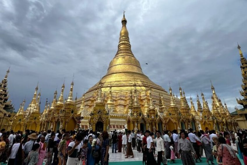 The main, gold-plated spire of the Shwedagon pagoda in Myanmar rises 99 metres (325 feet)