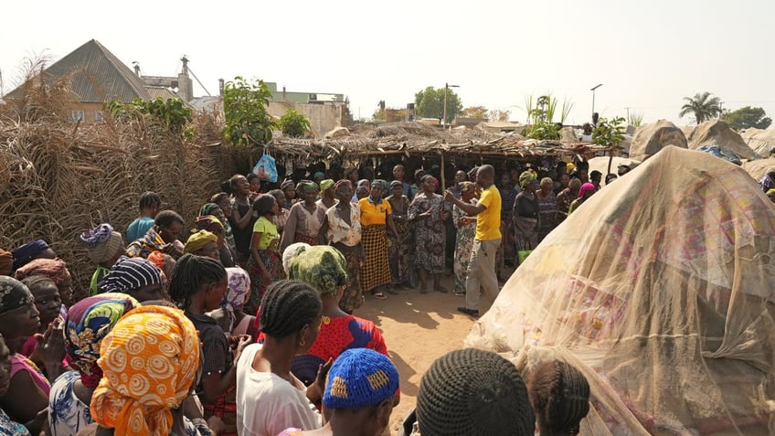 Pastor Benjamin Barnabas leads a service of Christian IDPs in a Nigerian refugee camp.