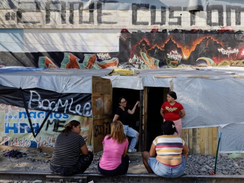 A group of migrant women is at a camp in the Gustavo A. Madero borough of Mexico City, Mex