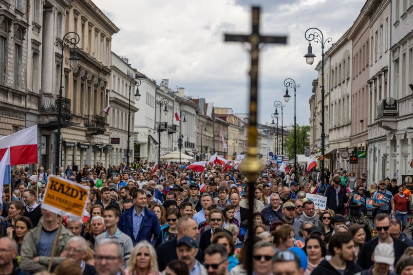 People take part in the March of Life - a demonstration by pro-life organizations against the liberalization of abortion rights, in Warsaw, on April 14, 2024. (Photo by Wojtek Radwanski / AFP) (Photo by WOJTEK RADWANSKI/AFP via Getty Images)