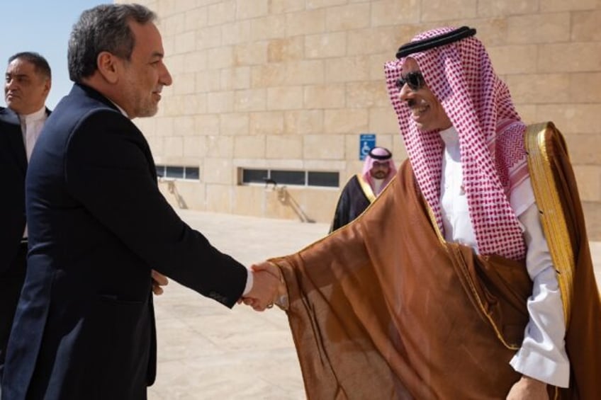 Iran's Foreign Minister Abbas Araghchi, pictured with Saudi Foreign Minister Prince Faisal