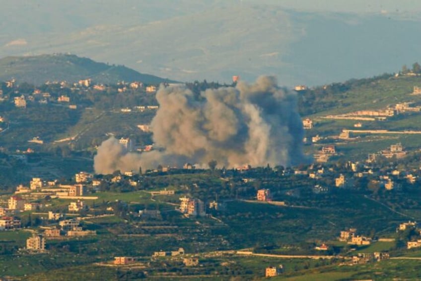 Smoke billows after an Israeli strike on Lebanon's southern village of Hula