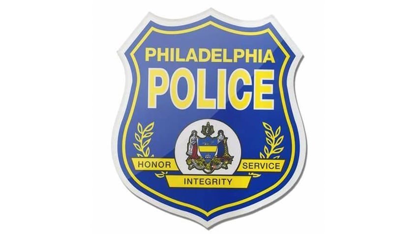 three philadelphia officers injured in shooting after dispute about video game police