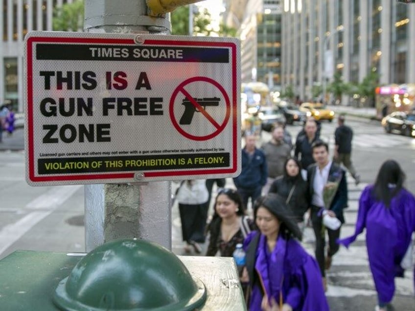 three wounded after suspect opens fire in gun free times square