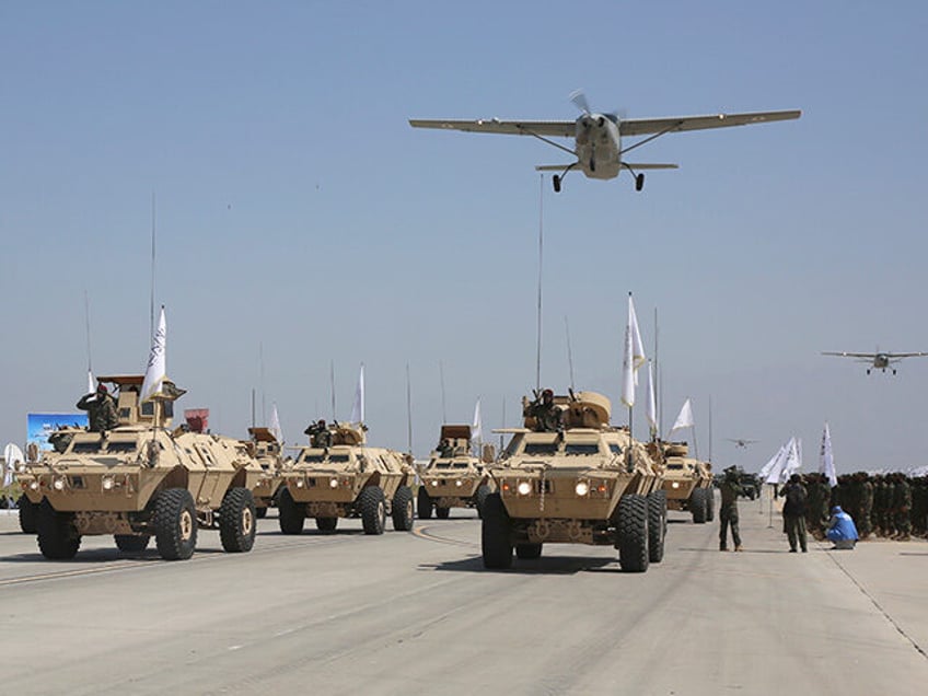 Taliban Military Vehicles are displayed during a military parade to mark the third anniver