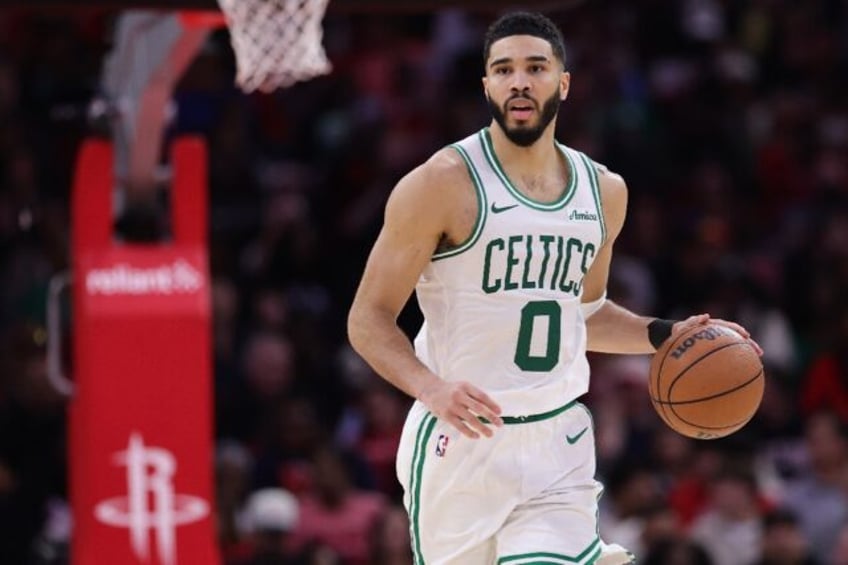 Jayson Tatum scored 20 points to help the reigning NBA champion Boston Celtics win at Hous