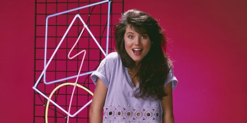 tiffani thiessen says she feels at ease about aging ahead of 50th birthday not really giving a s 