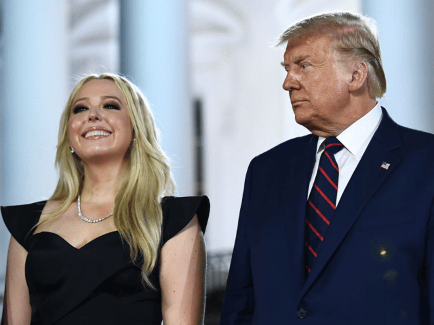 US President Donald Trump stands with daughter Tiffany Trump after he delivered his accept