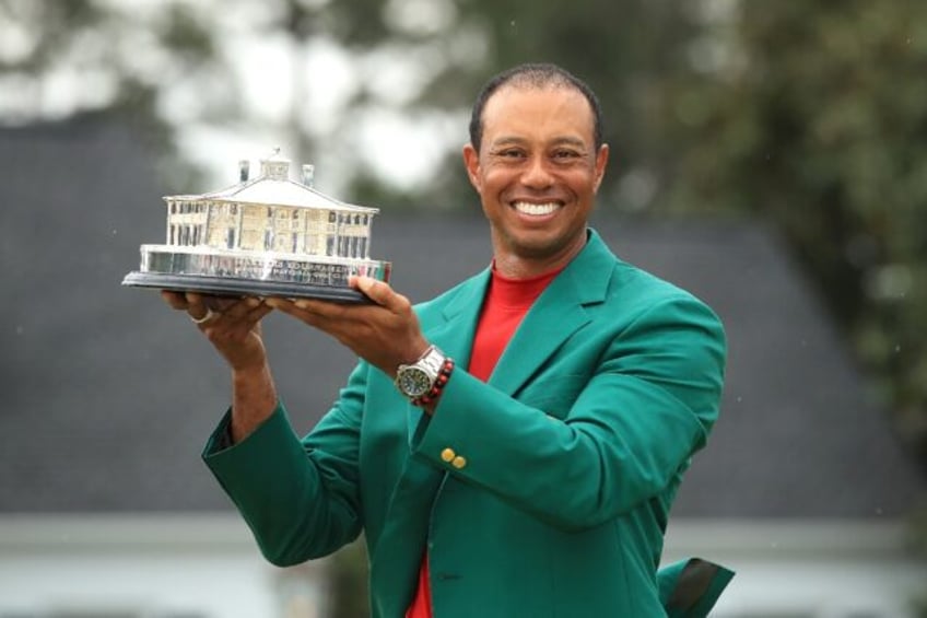 Tiger Woods, shown celebrating his 2019 Masters triumph, was listed in the field of player