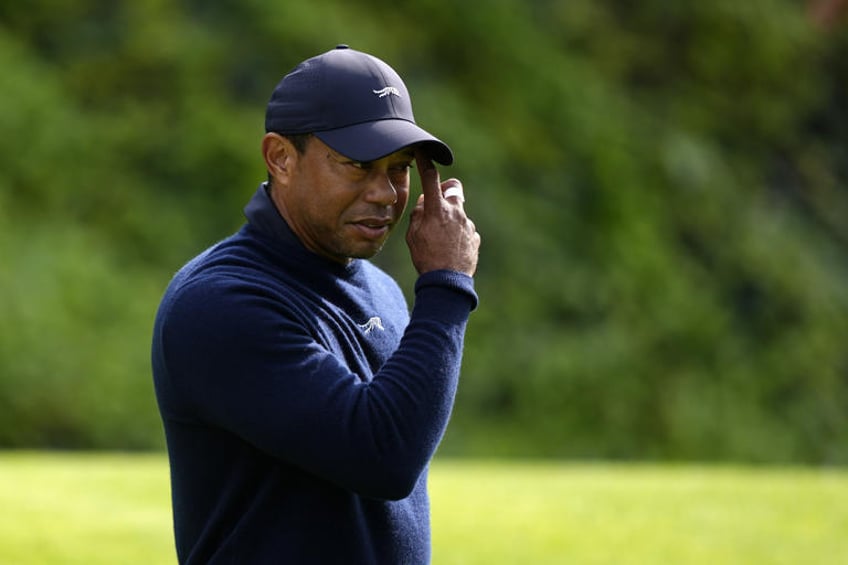 Tiger Woods waits to putt on the sixth green during the second round of the Genesis Invitational golf tournament at Riviera Country Club Friday, Feb. 16, 2024, in the Pacific Palisades area of Los Angeles. (AP Photo/Ryan Sun)