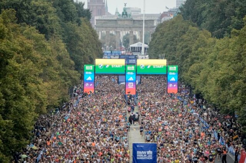 tigst assefa shatters the womens marathon world record by more than 2 minutes in berlin