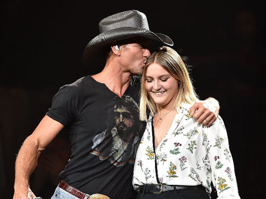 NASHVILLE, TN - AUGUST 15: Musician Tim McGraw, left, performs with his daughter Gracie M