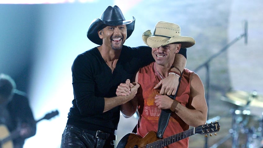 Tim McGraw and Kenny Chesney at the ACM Awards