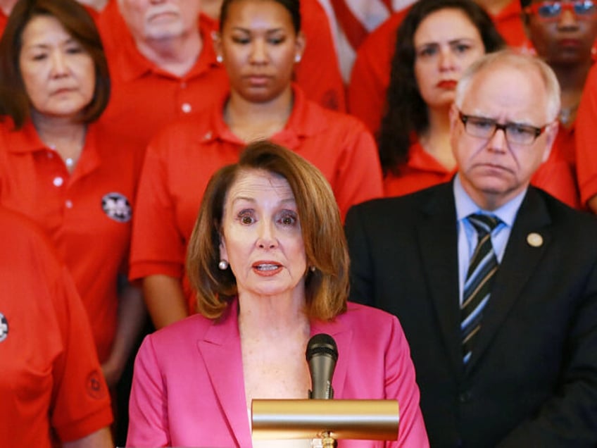 House Minority Leader Nancy Pelosi (D-CA) (C) addresses members of the Machinists Union In