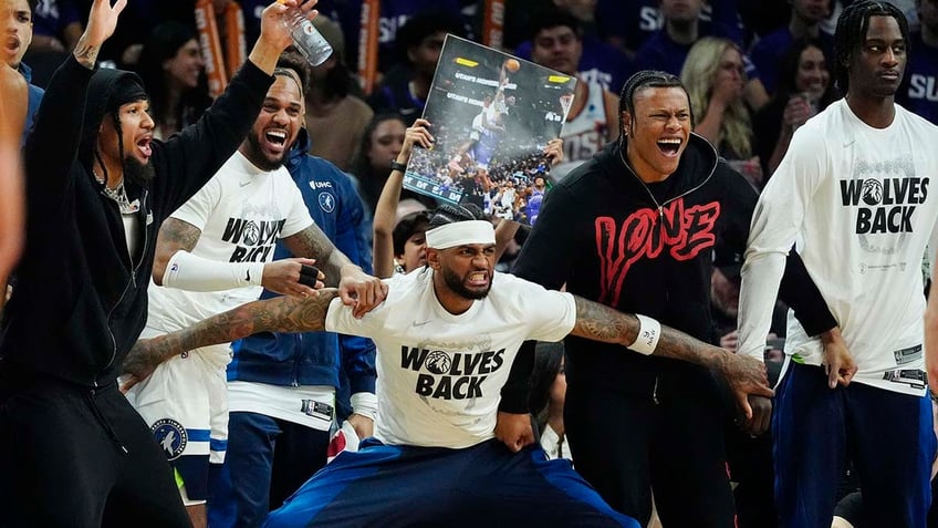 T'Wolves players celebrate