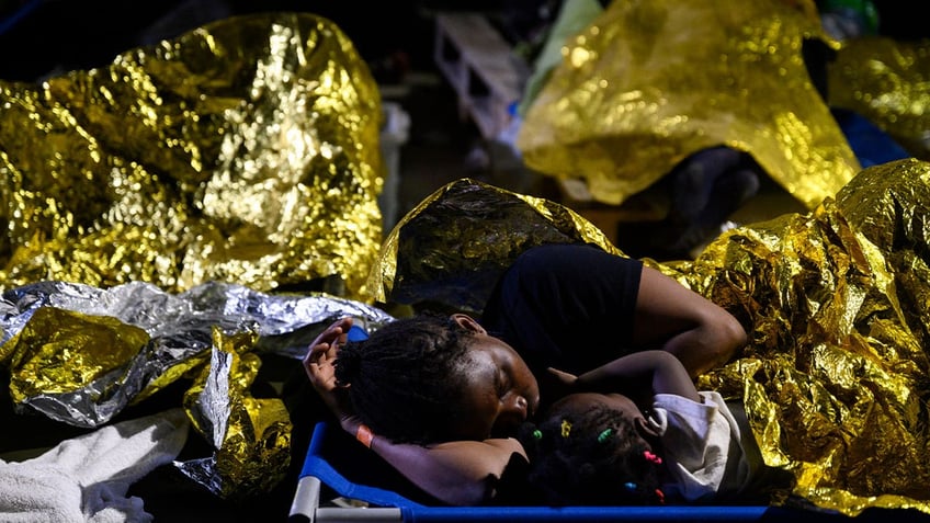 tiny italian island overwhelmed with thousands of migrants who arrived within 24 hours