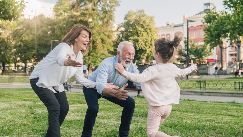 Grandparents with granddaughter