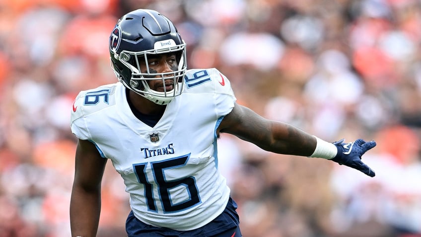 titans treylon burks carted off field after hitting head on field laying motionless