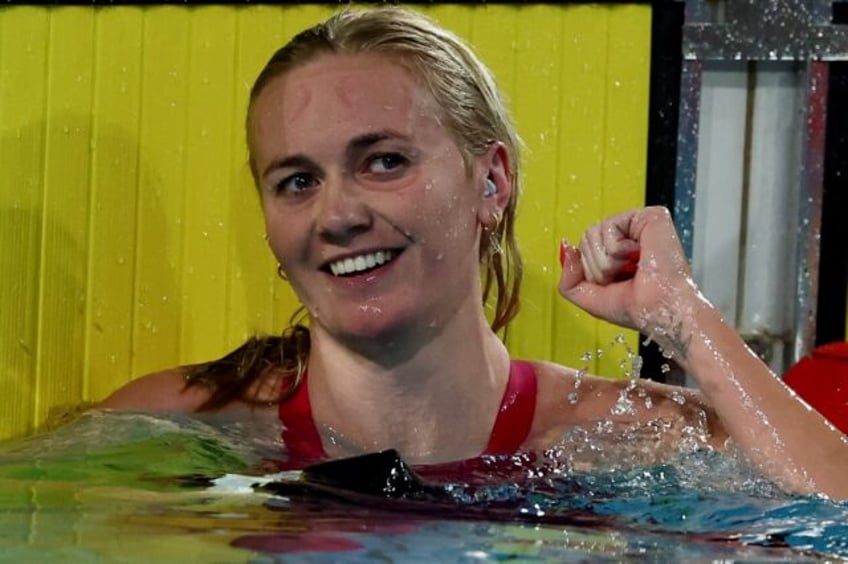 Australia's Ariarne Titmus celebrates victory in the 400m freestyle at the Australian Oly