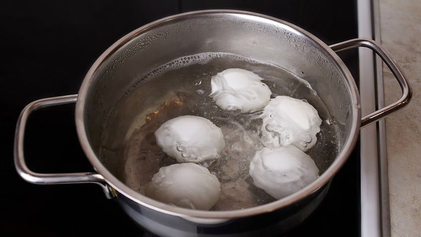 Eggs in a pot of boiling water