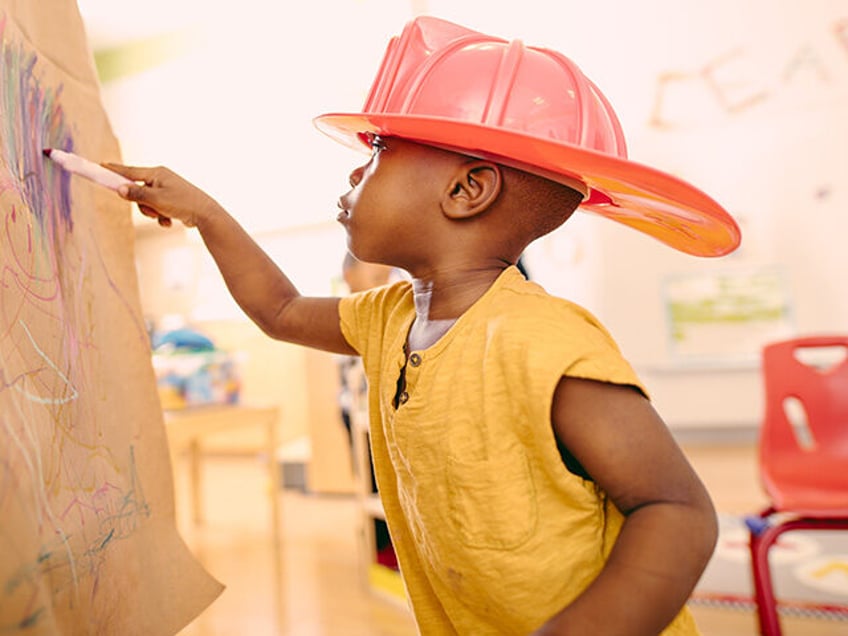 boy in fireman hat