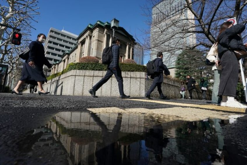 Japanese stocks rose Thursday as traders weigh a central bank policy announcement and mark