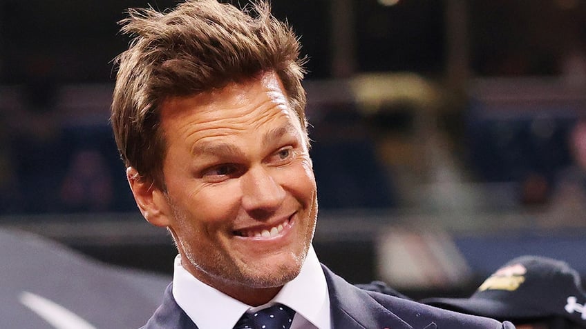 Tom Brady smiles