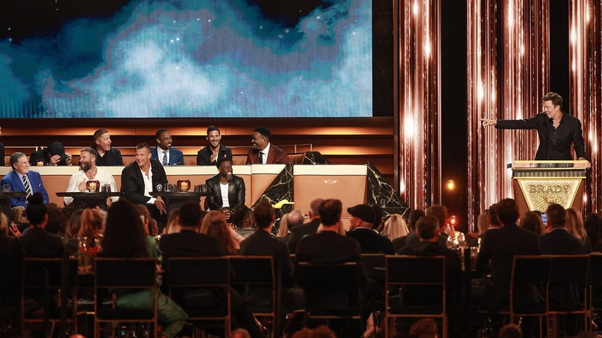Tom Brady on stage at the roast