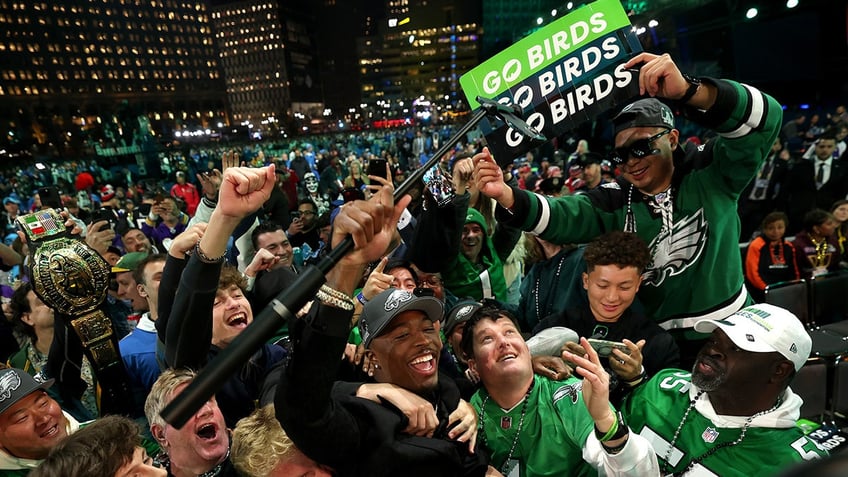 Eagles fans celebrate at the draft
