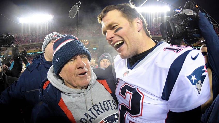 Tom Brady and Bill Belichick celebrate