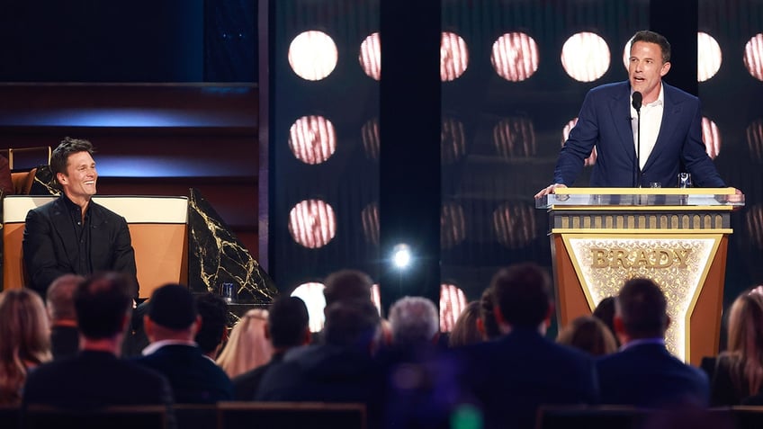 Ben Affleck behind the podium during his roast for Tom Brady