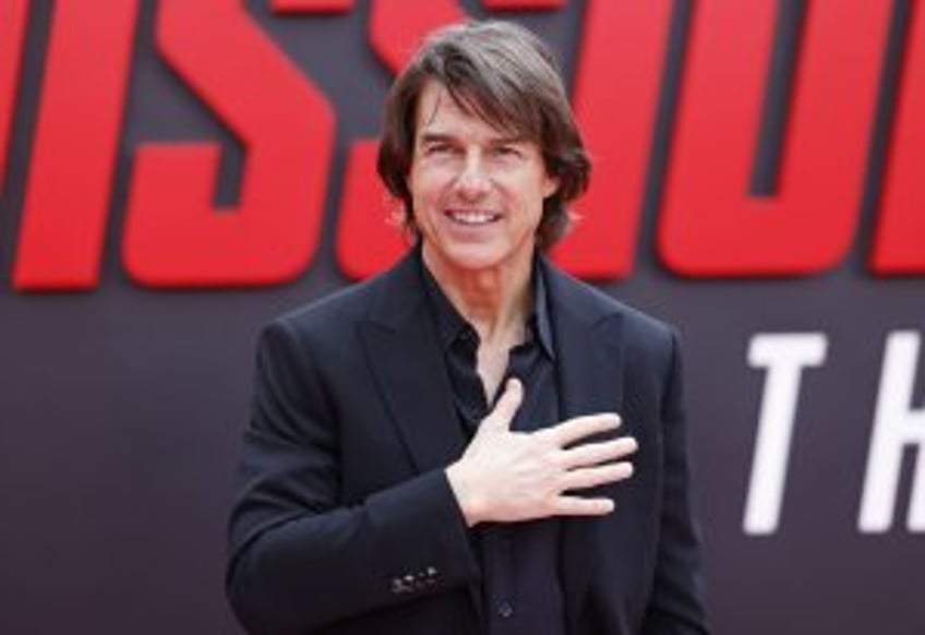 Tom Cruise's burning parachute stunt earns Guinness World Record