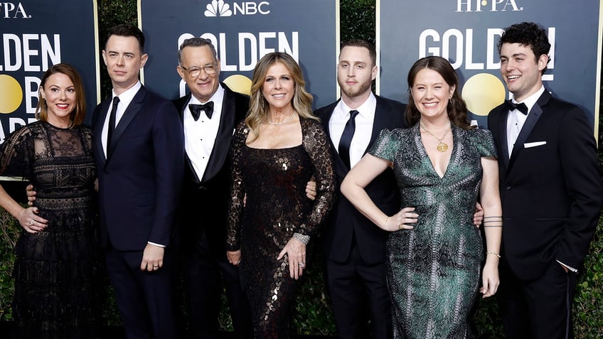 Tom Hanks in a tuxedo at the Golden Globes with his entire family Samantha Bryant (Colin's wife), Colin Hanks, Rita Wilson, Elizabeth Ann Hanks, Chet Hanks and Truman Theodore Hanks